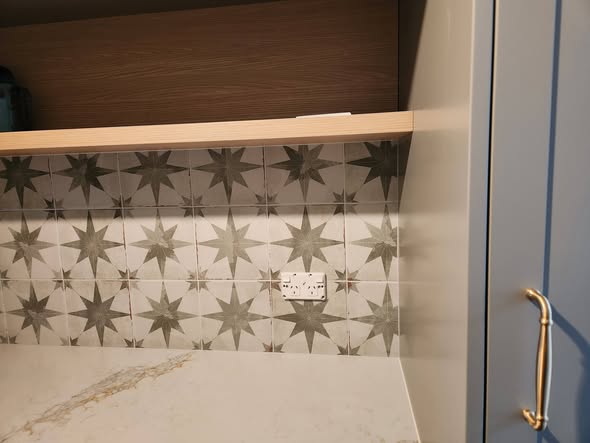 Monochrome star Moroccan pattern tile close detail