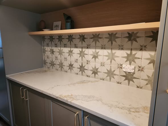 Monochrome star Moroccan patterned tile feature splashback